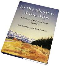 Book cover: in the shadow of the alps