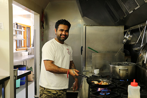 Deep cooking his dish