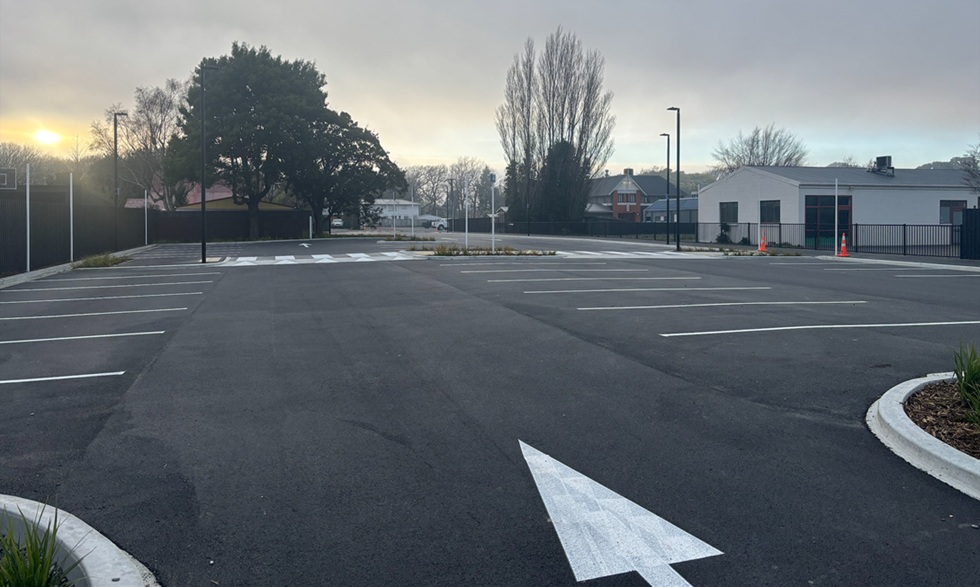 New sealed car park with marked spaces