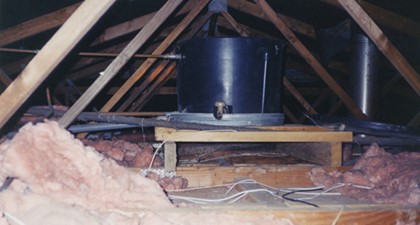 A roof space water tank unrestrained