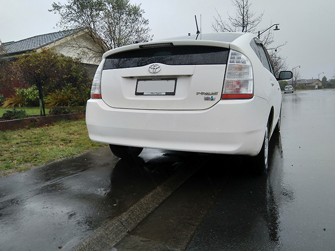 Car parked on footpath