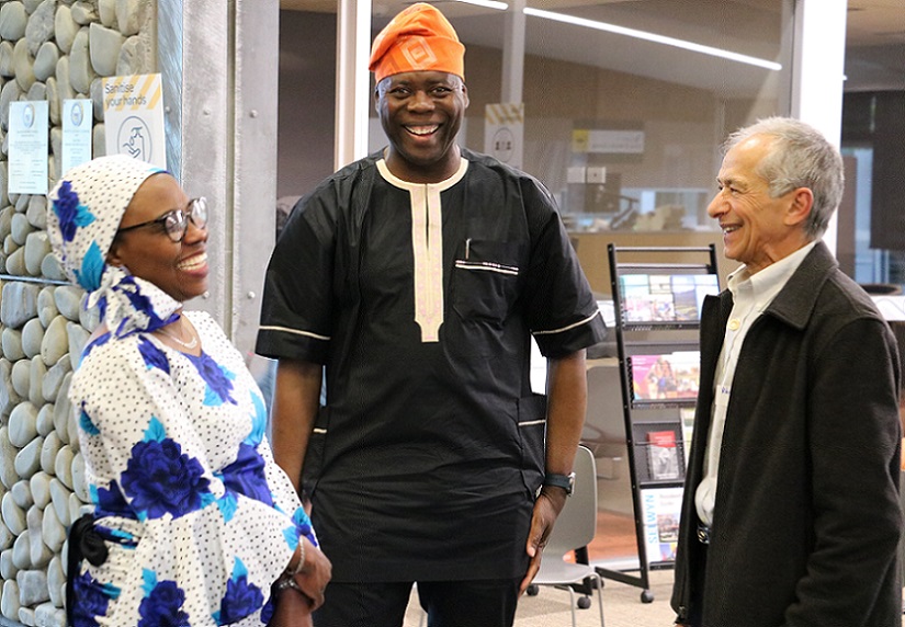 Sade and Shamsideen Iposu laugh with Farhad Dastgheib at the Faces of Selwyn launch