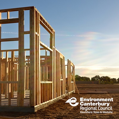 Picture of the partially completed frame of a house that is being built