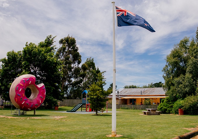 image of the Springfield reserve showing the flag pole, playground and donut