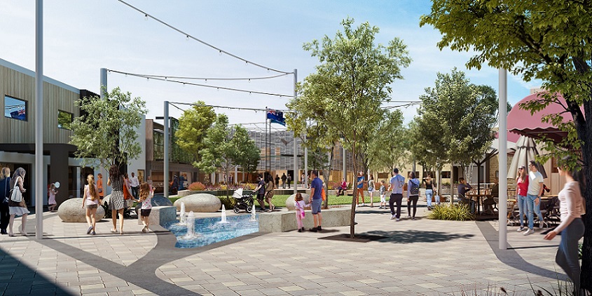 An artists impression of the town square with people walking through and a fountain and trees