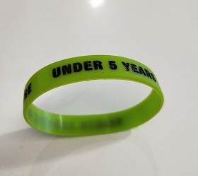 An image of the green under 5s wrist band