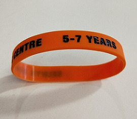 An image of the orange 5-7 years wrist band