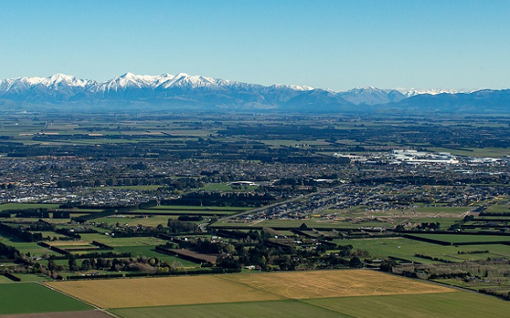 An aerial image of the plains looking towards the Southern Alps