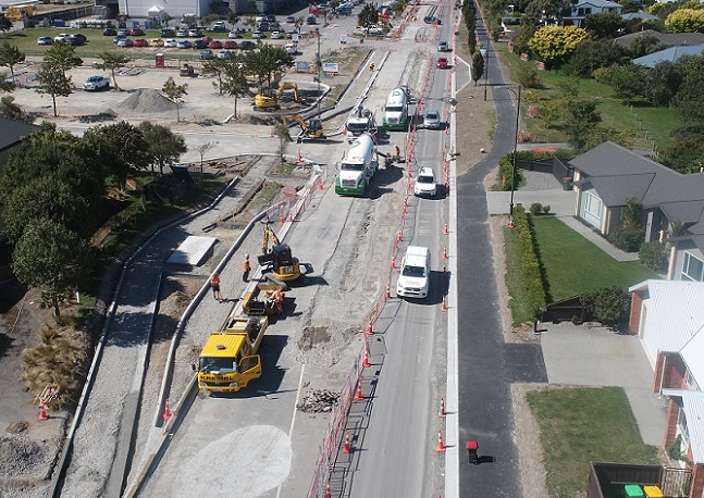 aerial image of trucks and diggers working along Rolleston Drive