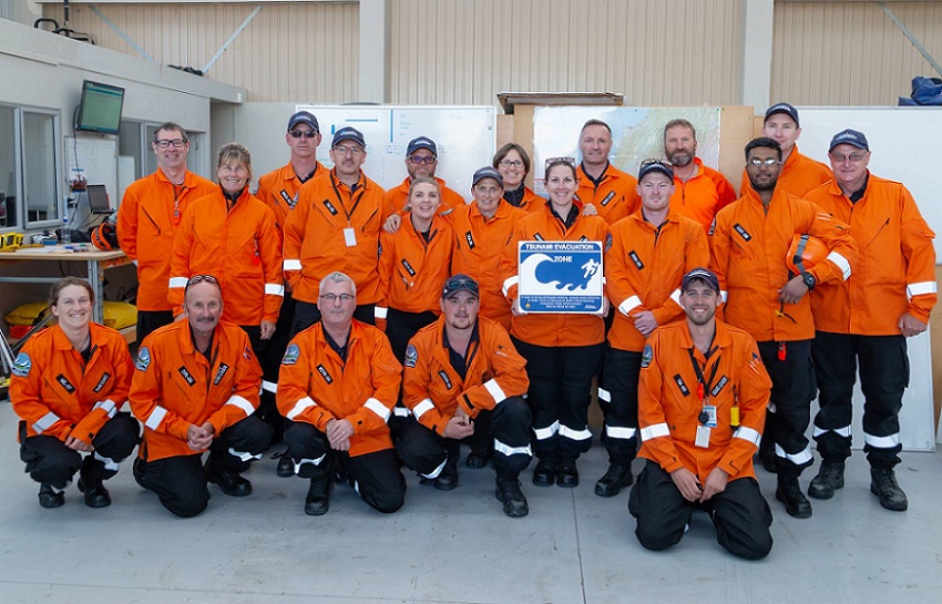 Group photo of the Selwyn Response Team in their high visibility orange jackets
