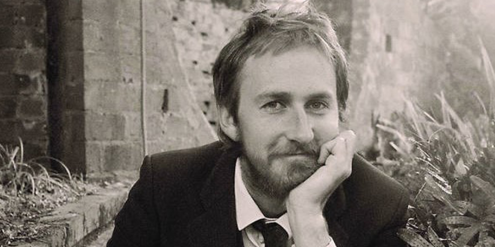 close up black and white image of musician Fraser Ross 