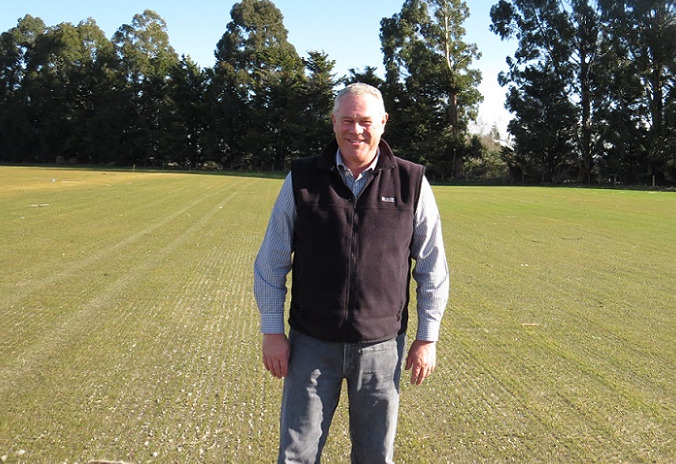 John Reid standing in a grassed sports field at Foster Park