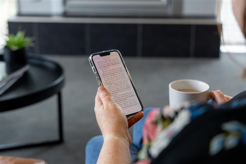Someone holding phone with text on phone