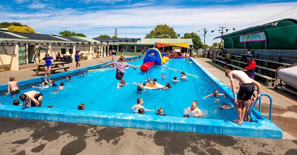 Children playing in the water at Darfield Pool
