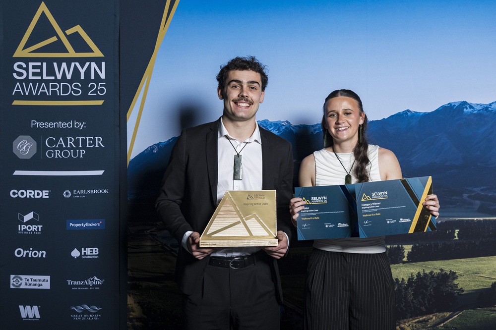 Two members of Waihora Kī o Rahi with their award for Inspiring Active Lives