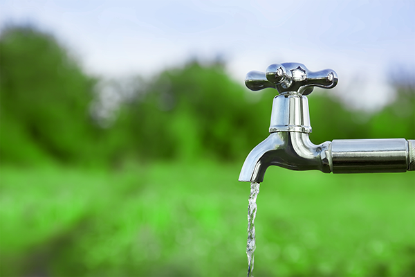 A tap with water dripping from it