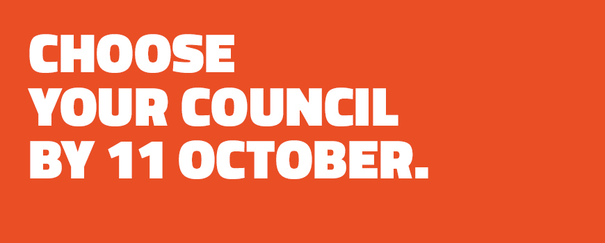 A red background with the text choose your council by 11 October
