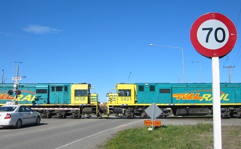 Rail crossing with train
